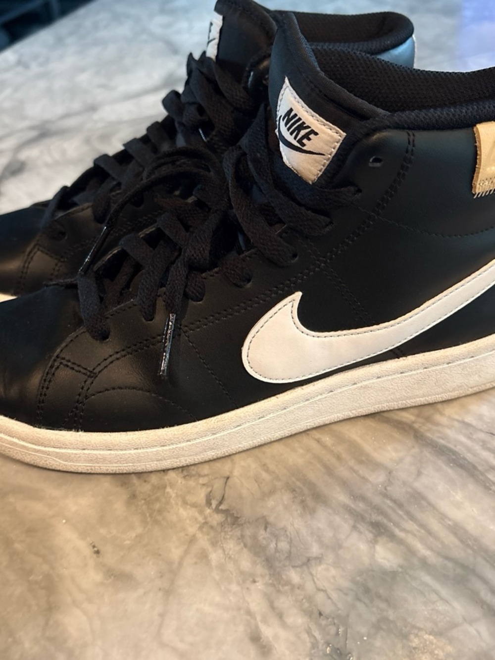 Nike Black and White Mid-Top Sneakers